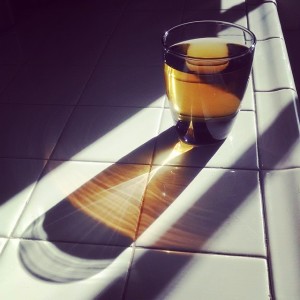 Pic I took of a glass of apple juice being penetrated by the afternoon light.